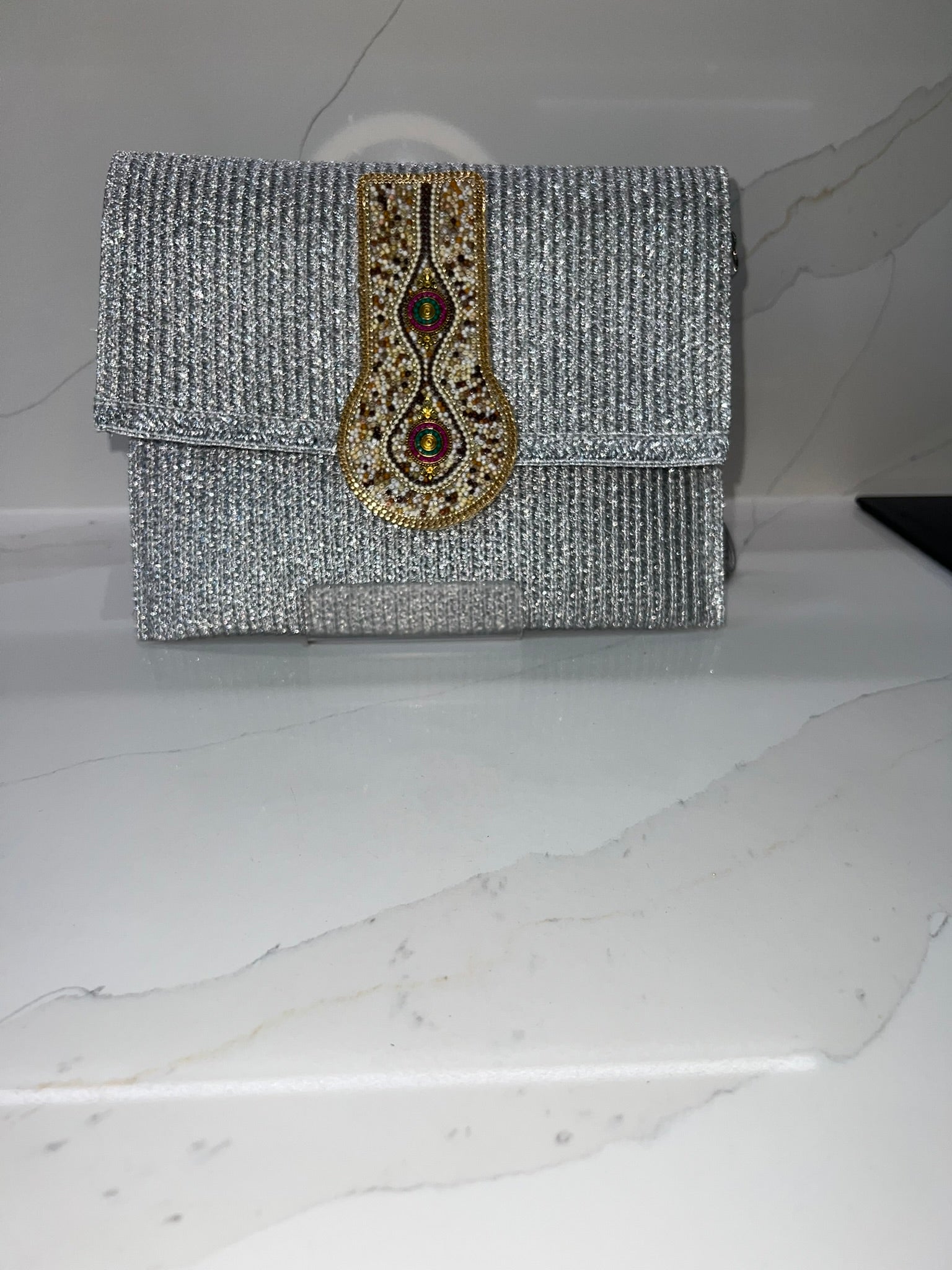 The Mirage Symbol Clutch