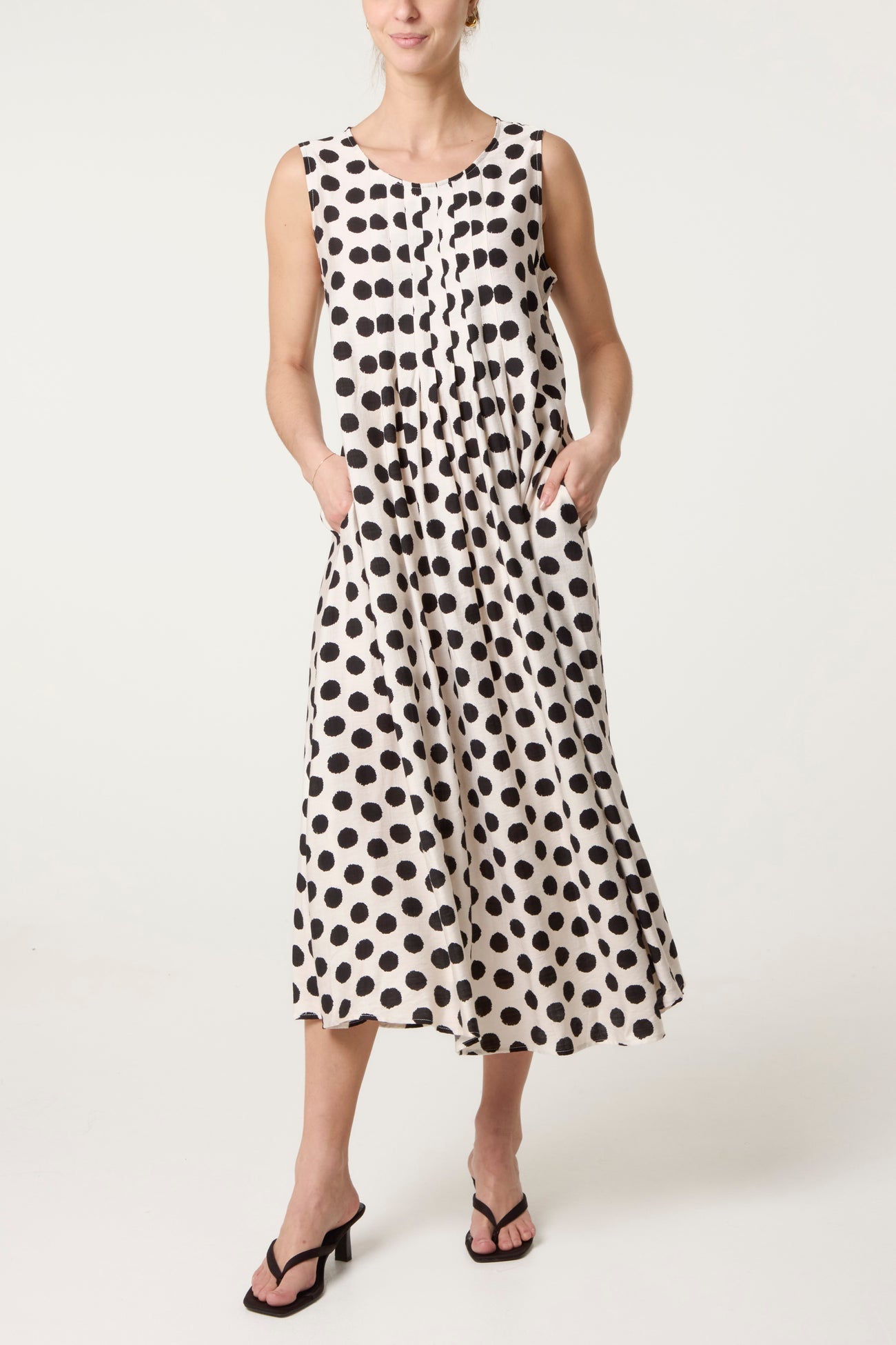 Emi – Polka Dot Sleeveless Midi Dress