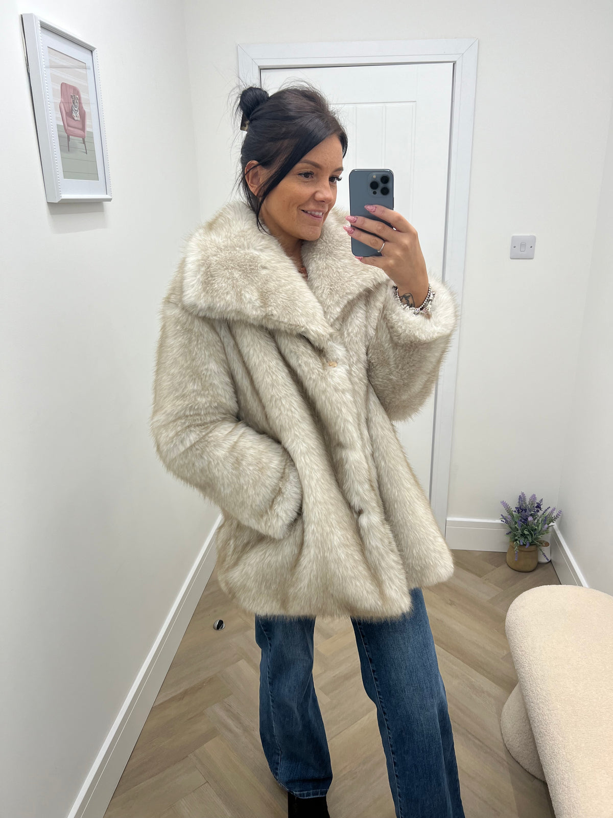 Longline fur coat