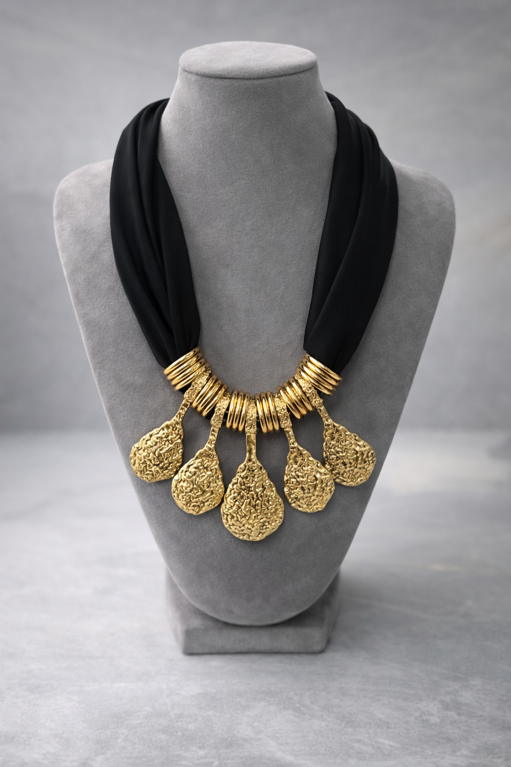 Gold statement scarf necklace with black scarf