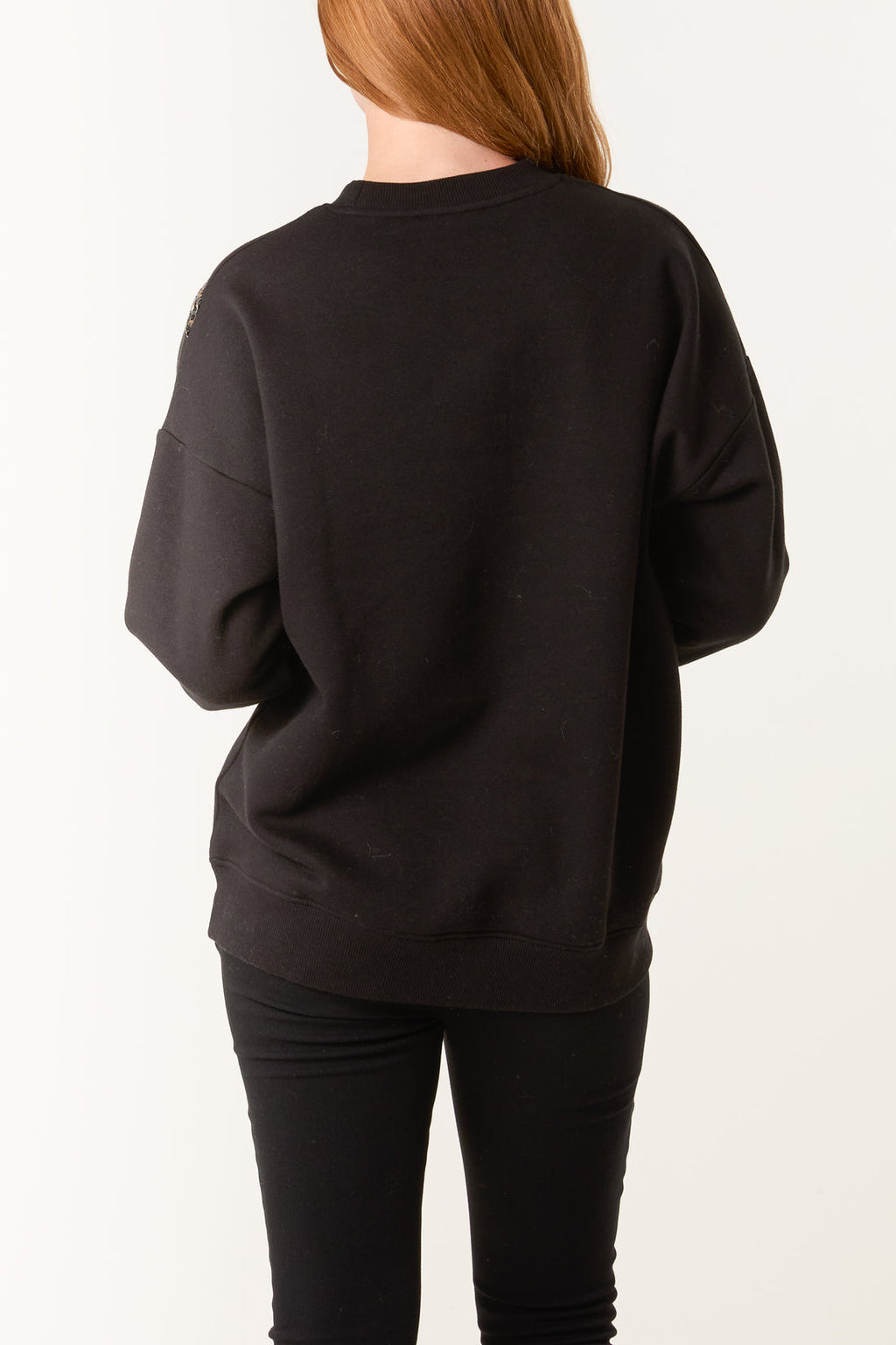 The Roxy — Sequin Animal Print Bow Sweatshirt