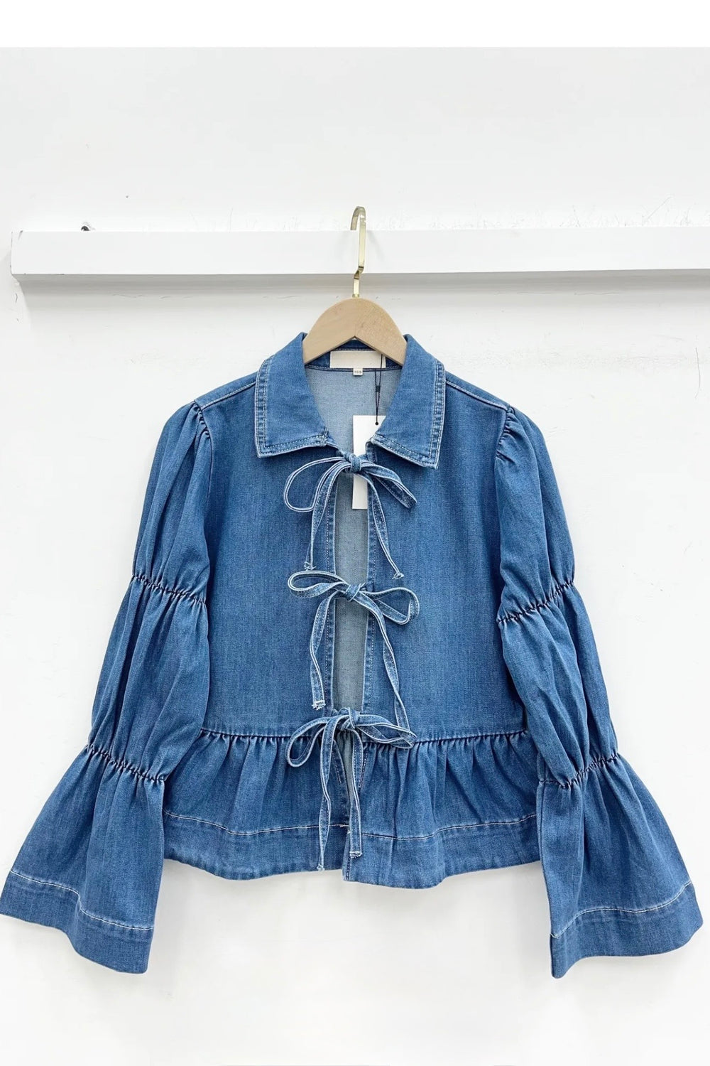 Denim Tie‑Front Peplum Jacket